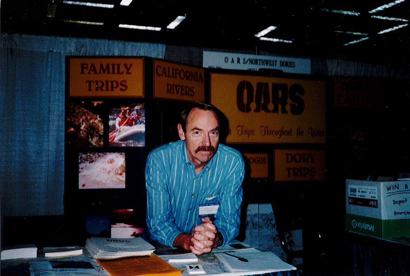 George Wendt working a trade show booth in the early days of OARS