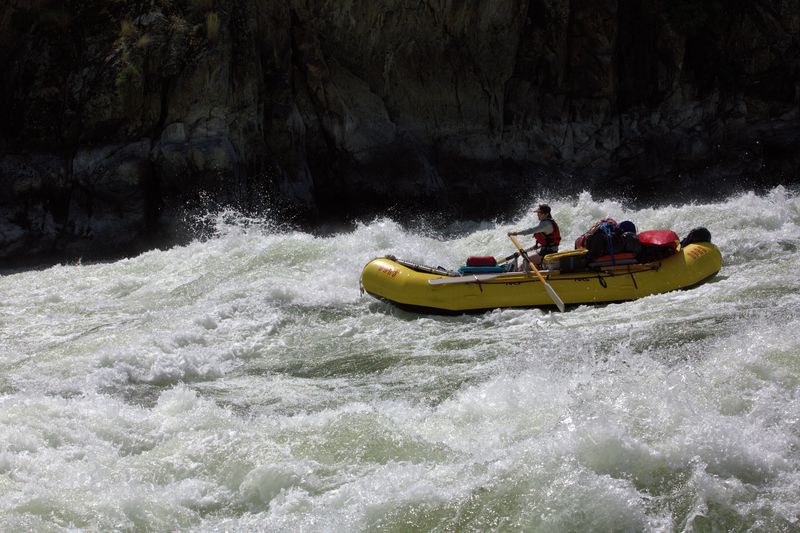 River guide through rapids in Hells Canyon