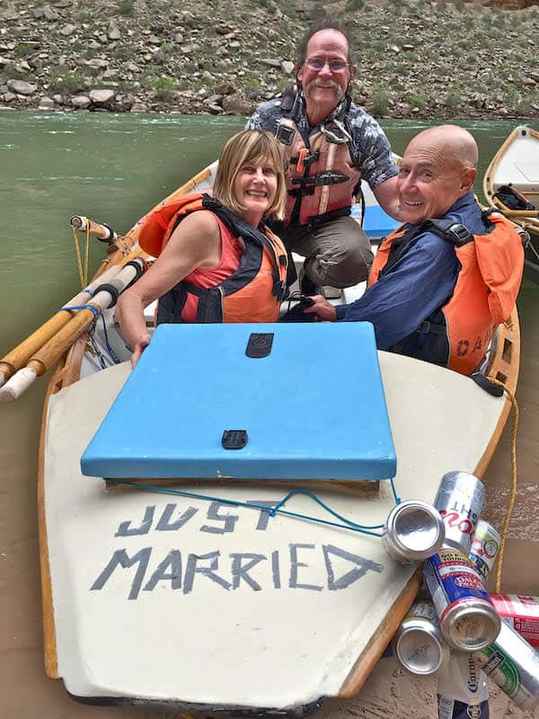 Pat and Cyndie in a dory after getting married on a Grand Canyon river trip 