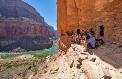 OARS guests find shelter from the sun at Nankoweap Granaries in Grand Canyon