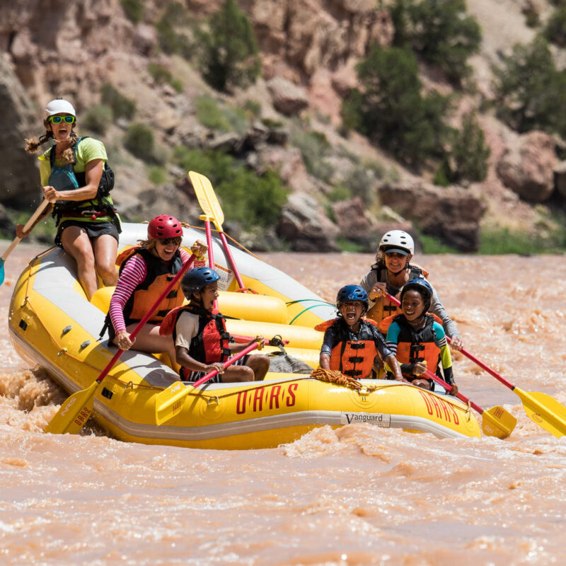 Group white water rafting on a river near Dinosaur National Monument.