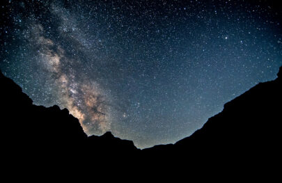 timed exposure of night sky above Grand Canyon with the Milky Way extremely pronounced