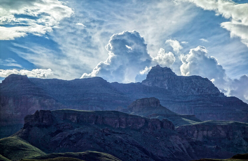 View of cumulus clouds above the cliffs of Grand Canyon