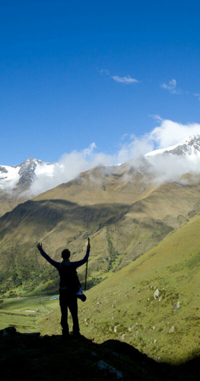 Person hiking in the mountains of Peru.