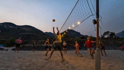 Luci solar lights illuminate an evening volleyball game on the Lower Salmon River