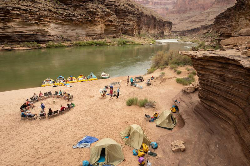 OARS rafting's signature chair circle on a guided river trip in Grand Canyon