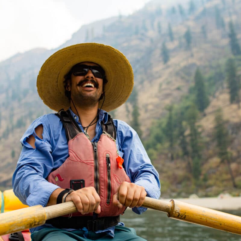 Smiling guide on the raft on the Main Salmon river.
