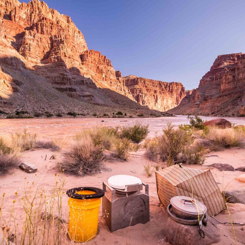 portable toilet sitting outside in a canyon.