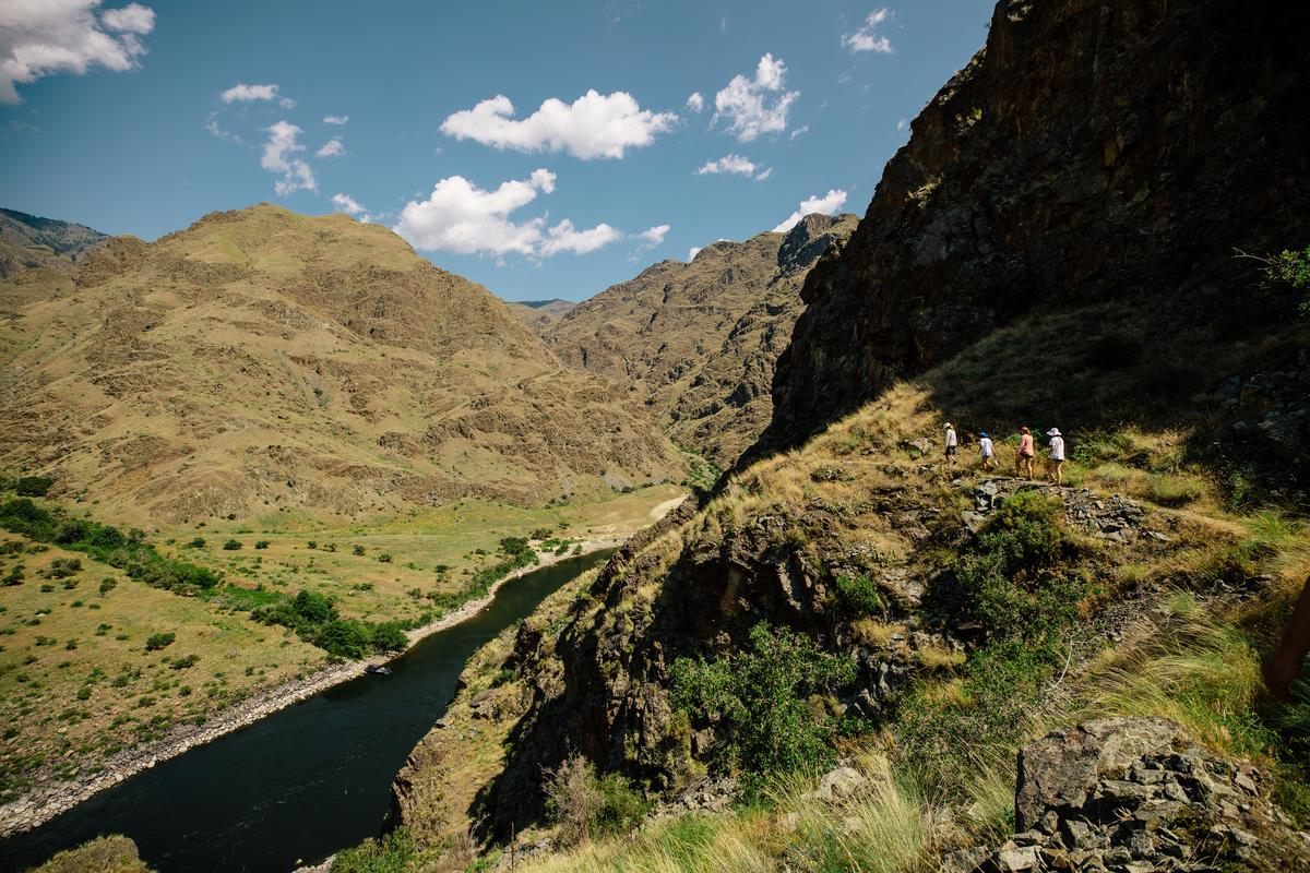 Hikers approaching a Snake River overlook in Hells Canyon