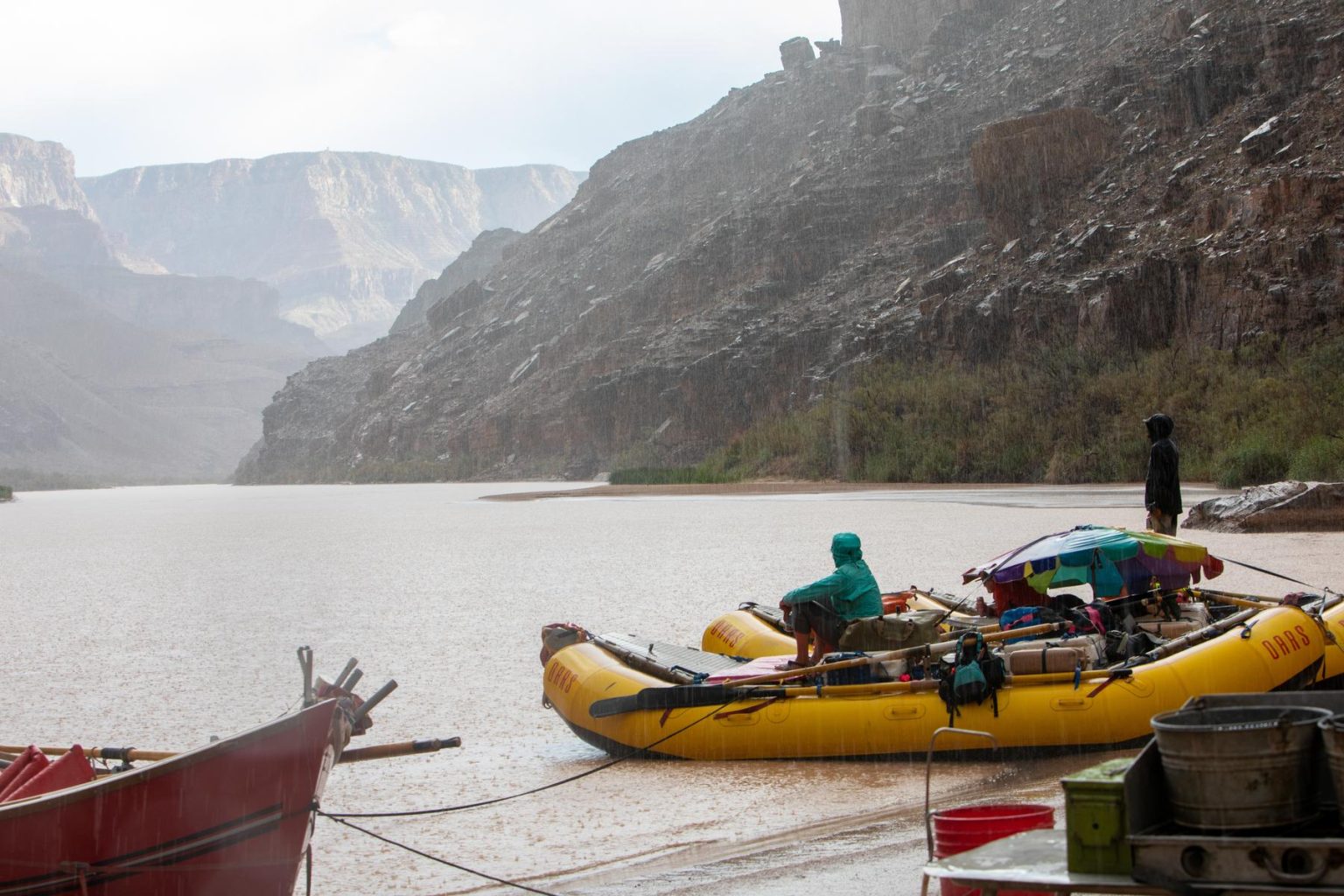 A rainy scene at camp during a Grand Canyon rafting trip with OARS